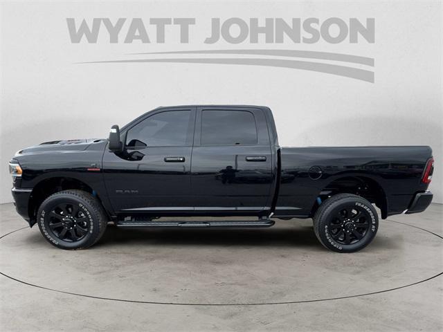 Photo of 2024 Diamond Black Crystal Pearlcoat RAM 2500