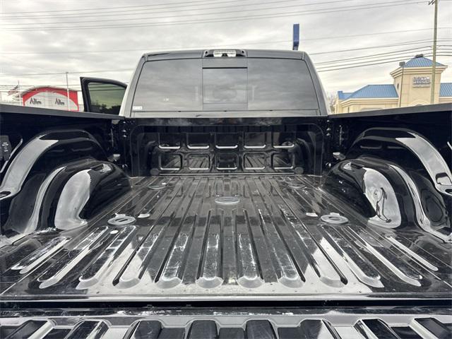 Photo of 2024 Diamond Black Crystal Pearlcoat RAM 2500