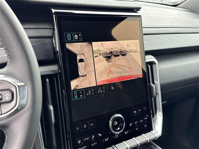 Photo of 2025 Volcanic Red Tintcoat GMC Acadia