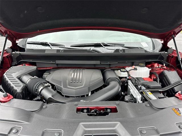 Photo of 2025 Volcanic Red Tintcoat GMC Acadia