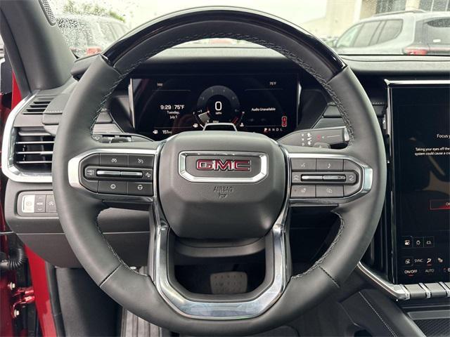 Photo of 2025 Volcanic Red Tintcoat GMC Acadia