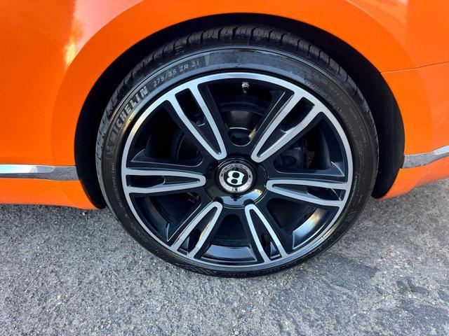 Photo of 2014 Orange Flame Metallic Bentley Continental GT
