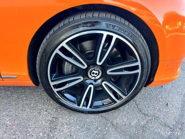 Photo of 2014 Orange Flame Metallic Bentley Continental GT