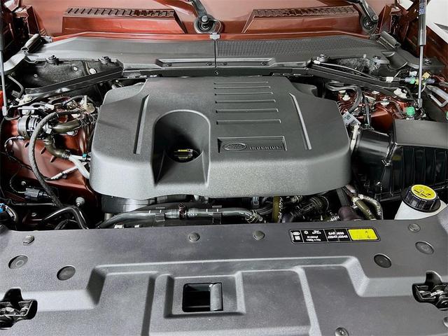 Photo of 2024 Sedona Red Land Rover Defender