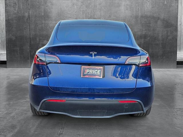 Photo of 2024 Deep Blue Metallic Tesla Model Y