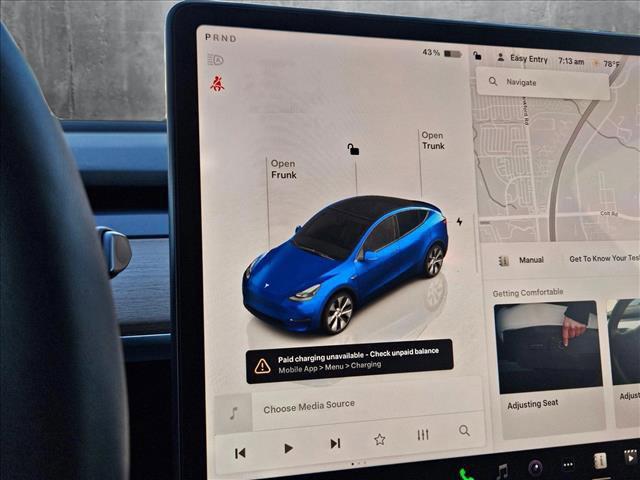 Photo of 2024 Deep Blue Metallic Tesla Model Y