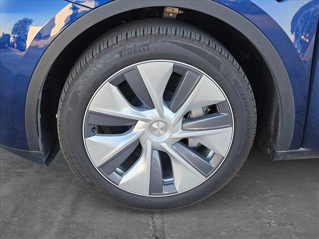 Photo of 2024 Deep Blue Metallic Tesla Model Y