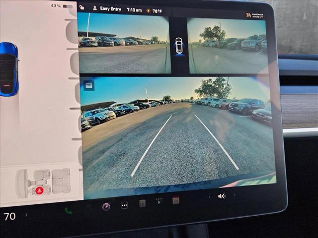 Photo of 2024 Deep Blue Metallic Tesla Model Y