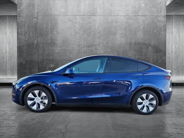 Photo of 2024 Deep Blue Metallic Tesla Model Y