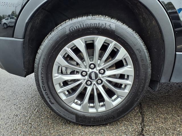 Photo of 2024 Stellar Black Metallic Cadillac XT4