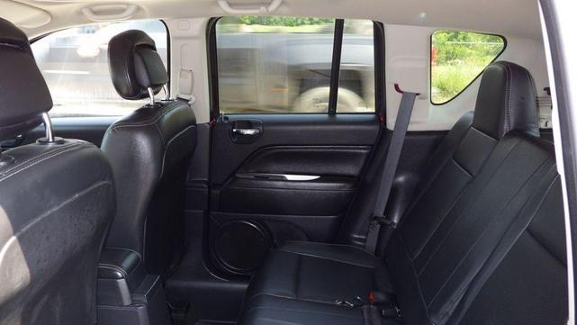 Photo of 2015 Maroon Jeep Compass