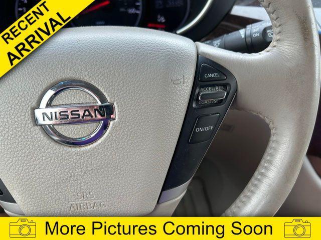 Photo of 2013 Platinum Graphite Metallic Nissan Quest