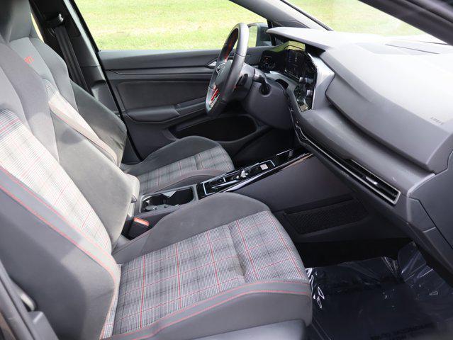 Photo of 2024 Deep Black Pearl Volkswagen Golf GTI