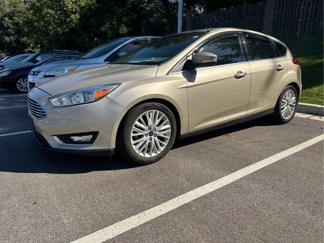 Photo of 2017 White Gold Metallic Ford Focus