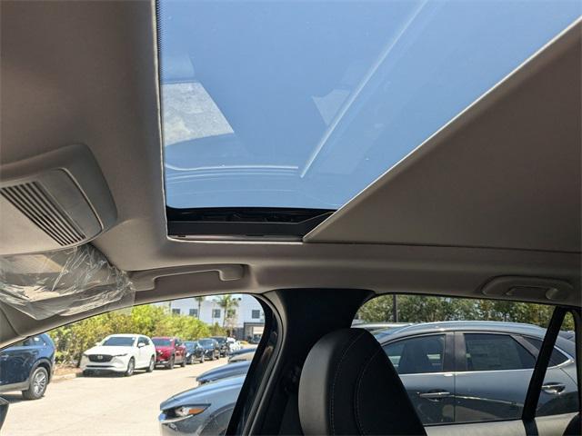 Photo of 2025 Ingot Blue Metallic Mazda CX-50
