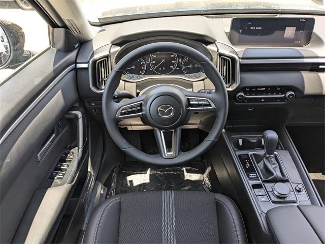 Photo of 2025 Ingot Blue Metallic Mazda CX-50