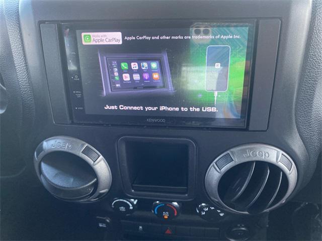 Photo of 2012 Bright Silver Metallic Clearcoat Jeep Wrangler Unlimited