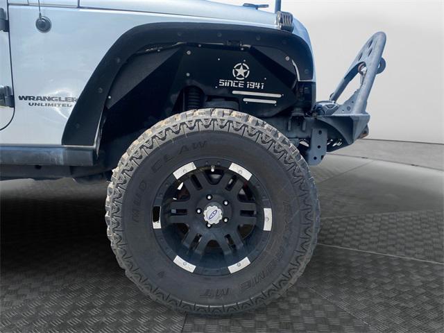 Photo of 2012 Bright Silver Metallic Clearcoat Jeep Wrangler Unlimited