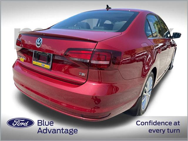 Photo of 2016 Cardinal Red Metallic Volkswagen Jetta