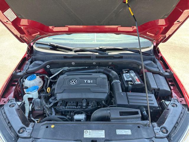 Photo of 2016 Cardinal Red Metallic Volkswagen Jetta