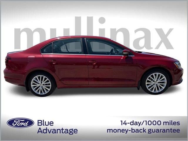 Photo of 2016 Cardinal Red Metallic Volkswagen Jetta