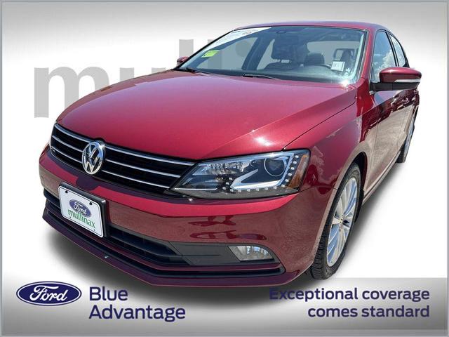 Photo of 2016 Cardinal Red Metallic Volkswagen Jetta
