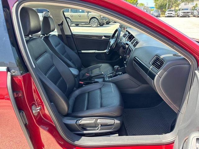 Photo of 2016 Cardinal Red Metallic Volkswagen Jetta