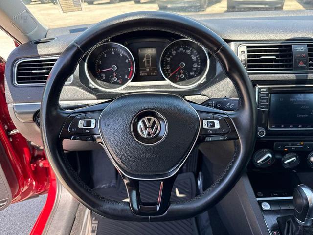 Photo of 2016 Cardinal Red Metallic Volkswagen Jetta