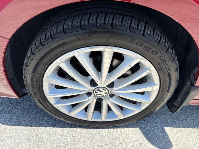 Photo of 2016 Cardinal Red Metallic Volkswagen Jetta