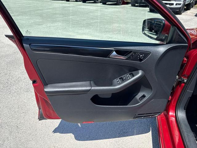 Photo of 2016 Cardinal Red Metallic Volkswagen Jetta