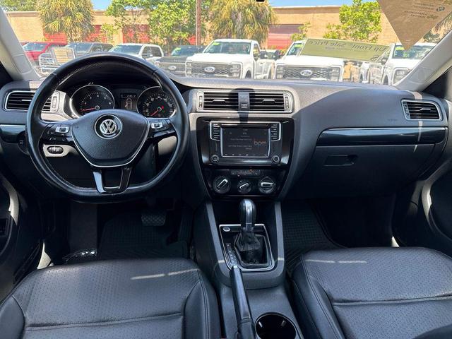 Photo of 2016 Cardinal Red Metallic Volkswagen Jetta