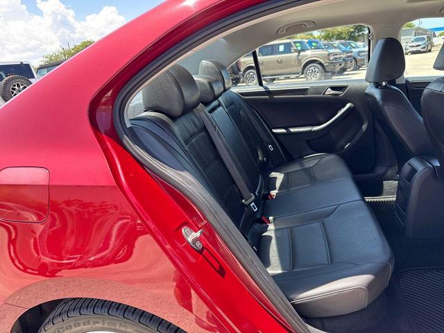 Photo of 2016 Cardinal Red Metallic Volkswagen Jetta