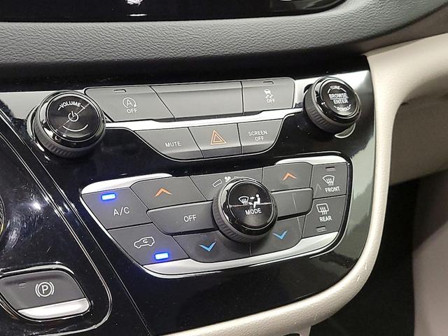 Photo of 2021 Burgundy Chrysler Voyager