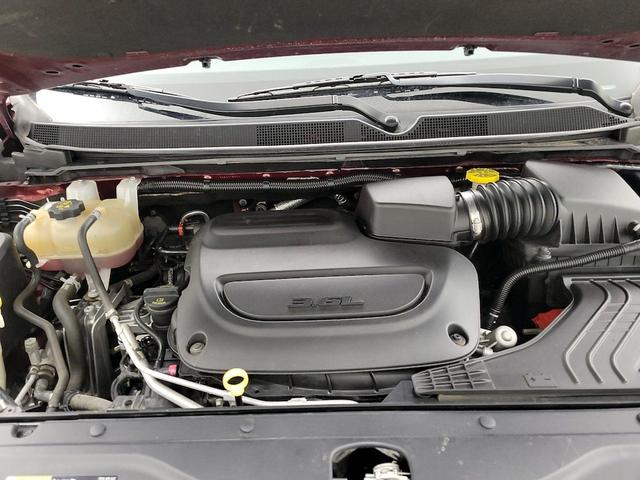 Photo of 2021 Burgundy Chrysler Voyager