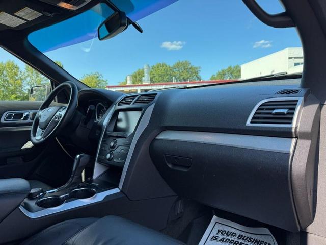 Photo of 2015 Ruby Red Metallic Tinted Clearcoat Ford Explorer