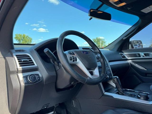 Photo of 2015 Ruby Red Metallic Tinted Clearcoat Ford Explorer