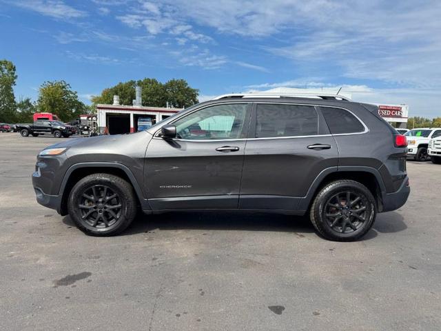 Photo of 2014 Granite Crystal Metallic Clearcoat Jeep Cherokee