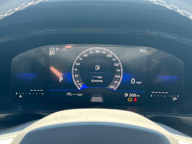 Photo of 2024 Dusk Blue Metallic Volkswagen Taos