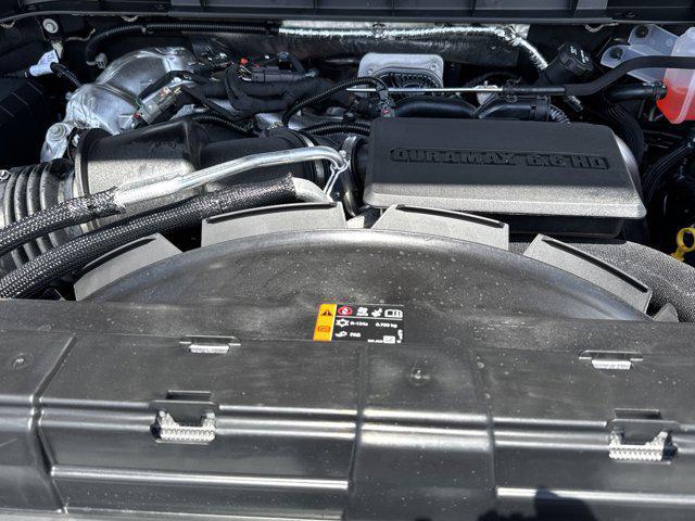 Photo of 2025 White Frost Tricoat GMC Sierra 2500