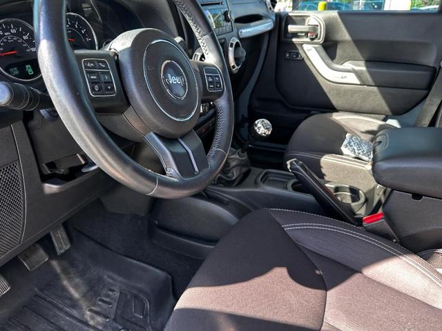 Photo of 2014 Anvil Clearcoat Jeep Wrangler Unlimited