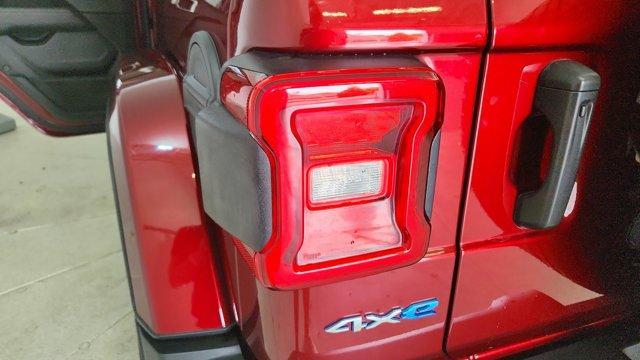 Photo of 2021 Snazzberry Pearlcoat Jeep Wrangler Unlimited 4xe