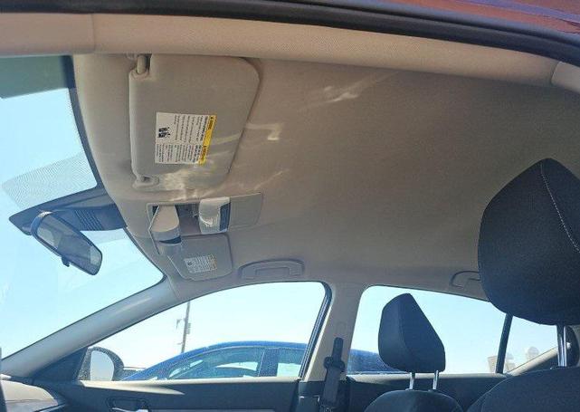 Photo of 2024 Garnet Pearl Metallic Nissan Altima
