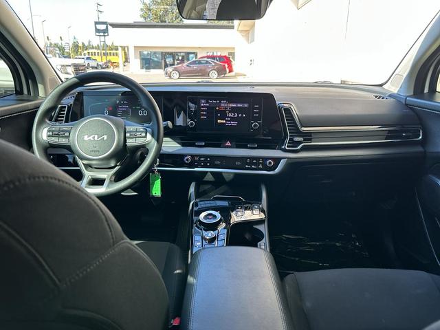Photo of 2023 Snow White Pearl Kia Sportage Hybrid