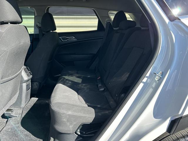 Photo of 2023 Snow White Pearl Kia Sportage Hybrid