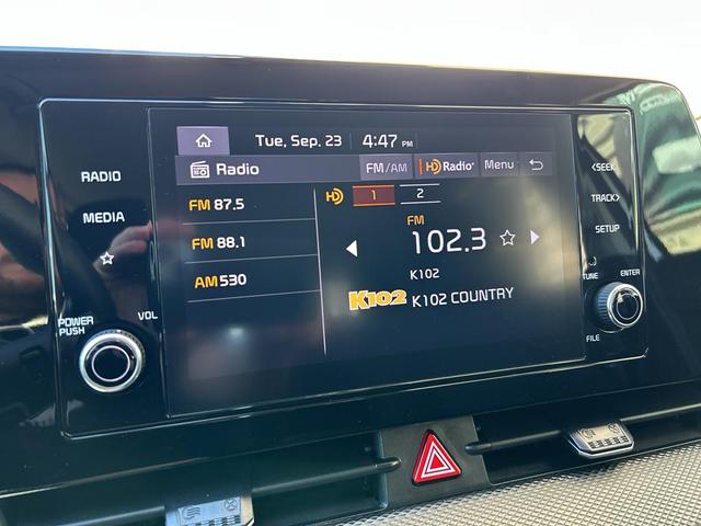 Photo of 2023 Snow White Pearl Kia Sportage Hybrid