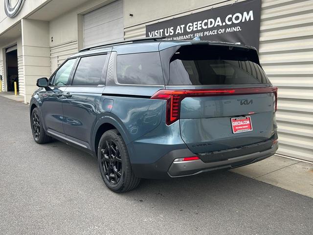 Photo of 2026 Astra Blue Kia Carnival Hybrid