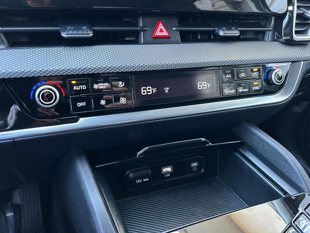 Photo of 2023 Fusion Black Kia Sportage Hybrid
