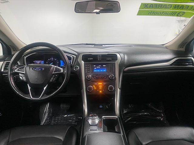 Photo of 2017 Ingot Silver Ford Fusion Hybrid