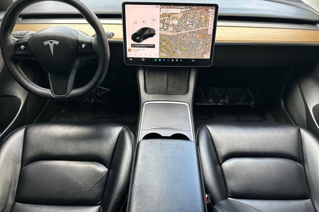Photo of 2021 Solid Black Tesla Model 3