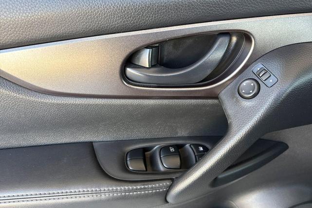 Photo of 2021 Magnetic Black Pearl Nissan Rogue Sport